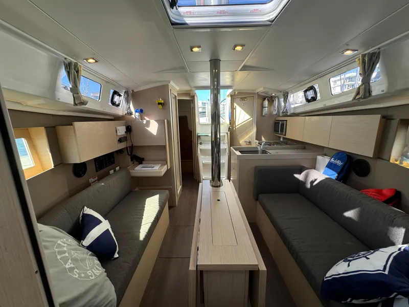 Slide: The Image of Interior of 2021 Beneteau Oceanis 35.1 sailboat, featuring modern design and comfortable seating. - 47