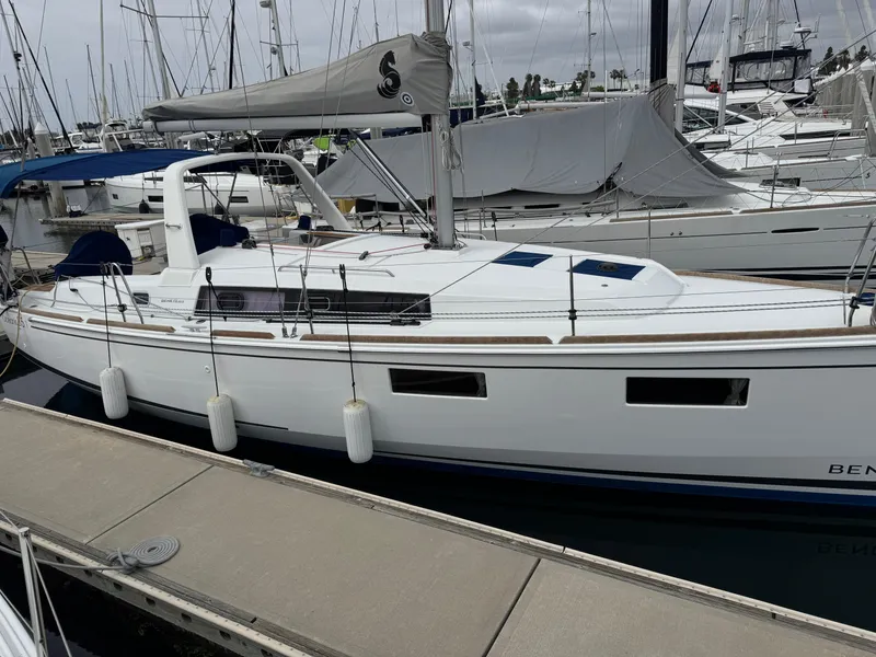 Slide: The Image of 2021 Beneteau Oceanis 35.1 sailboat docked at marina, side view. - 6
