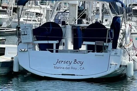 Slide: The Image of Beneteau Oceanis 35.1 sailboat named "Jersey Boy" docked at Marina del Rey, CA. - 7