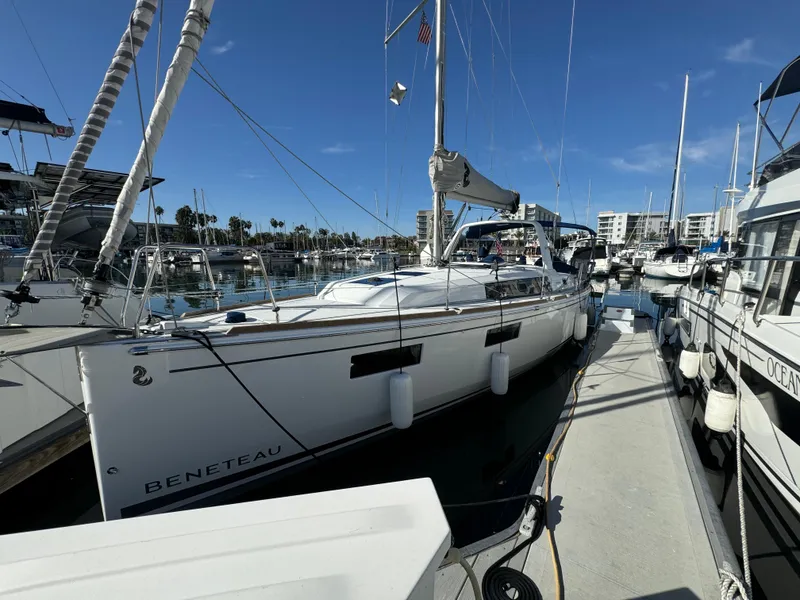 Slide: The Image of Beneteau Oceanis 35.1 sailboat docked at marina, 2021 model, sunny day. - 8