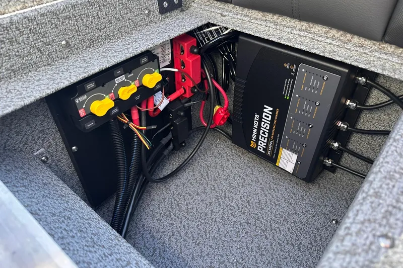 Slide: The Image of Electrical system of 2026 Lund 1875 Impact XS SS boat with Minn Kota Precision charger. - 25