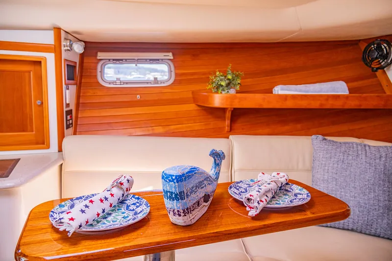 Slide: The Image of Interior of 2007 MJM 29z boat with dining table set for two. - 23