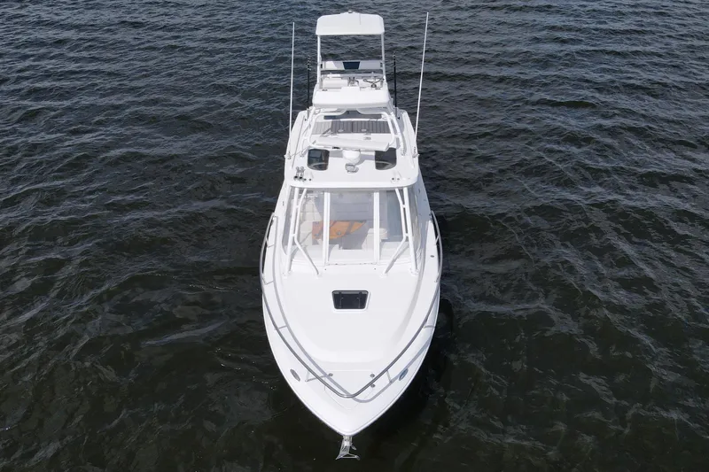 Slide: The Image of 2008 Everglades 350LX boat on open water, aerial view. - 6