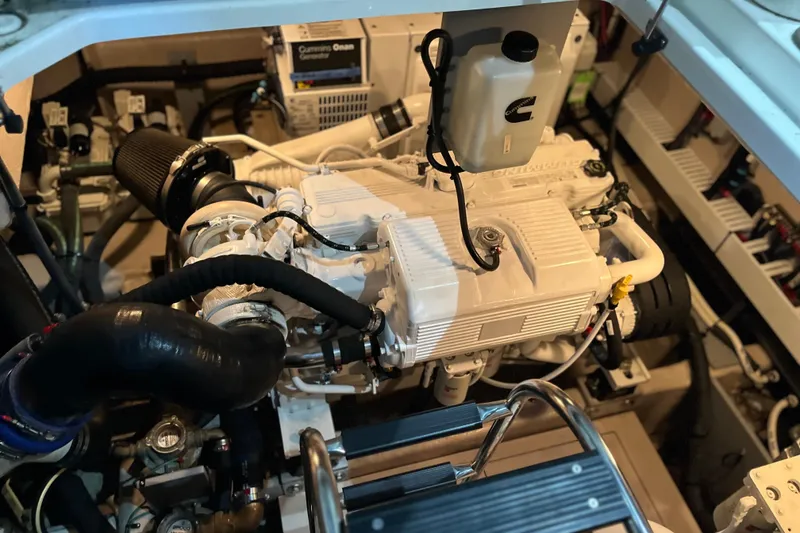 Slide: The Image of Manufacturer Provided Image: Modern bathroom in 2015 Sea Ray 510 Sundancer yacht with shower, sink, and toilet. - 12