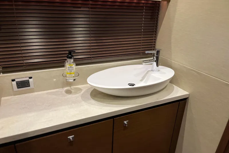 Slide: The Image of Luxurious cabin interior of 2015 Sea Ray 510 Sundancer yacht with elegant bedding. - 18