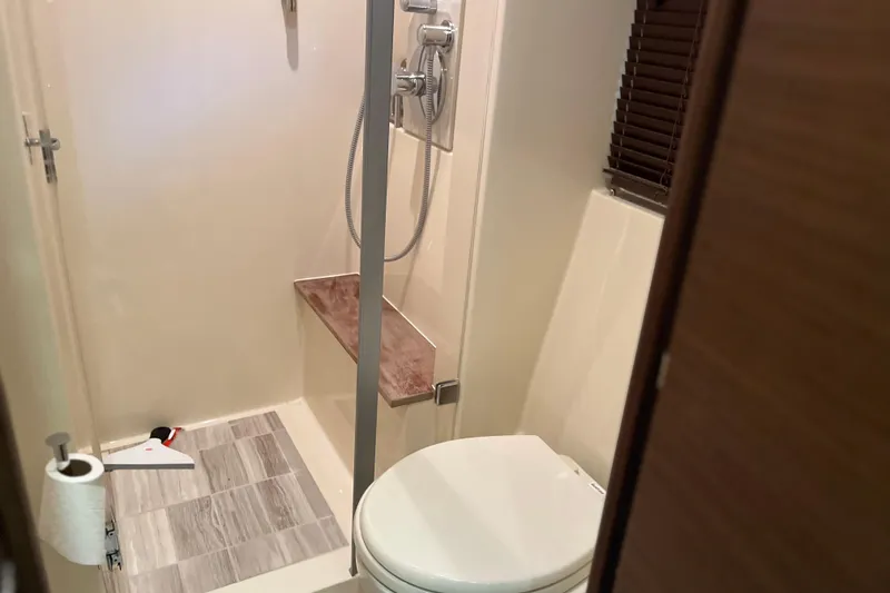 Slide: The Image of Luxurious bathroom in 2015 Sea Ray 510 Sundancer yacht with modern fixtures. - 19