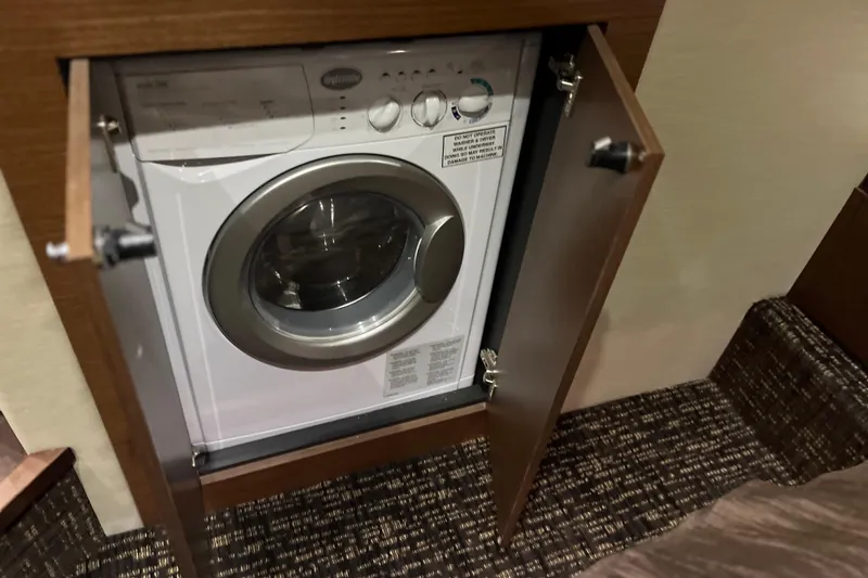 Slide: The Image of Engine compartment of a 2015 Sea Ray 510 Sundancer yacht with visible ladder. - 20