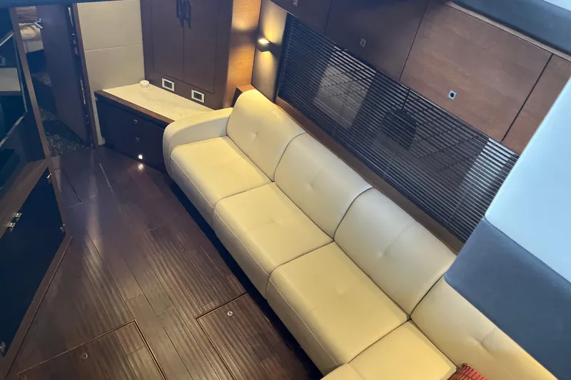Slide: The Image of Luxurious interior of 2015 Sea Ray 510 Sundancer yacht with cream leather seating. - 27