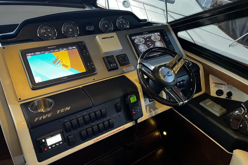 Slide: The Image of Control panel of 2015 Sea Ray 510 Sundancer yacht with throttle and joystick. - 31