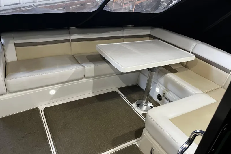Slide: The Image of 2015 Sea Ray 510 Sundancer interior with built-in storage compartment. - 37