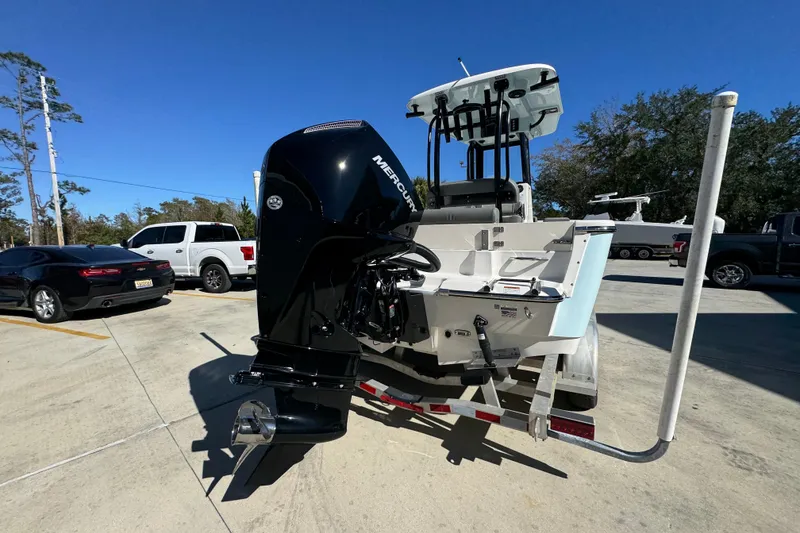 Slide: The Image of 2026 Sea Born LX22 Center Console boat on trailer with Mercury outboard motor. - 13