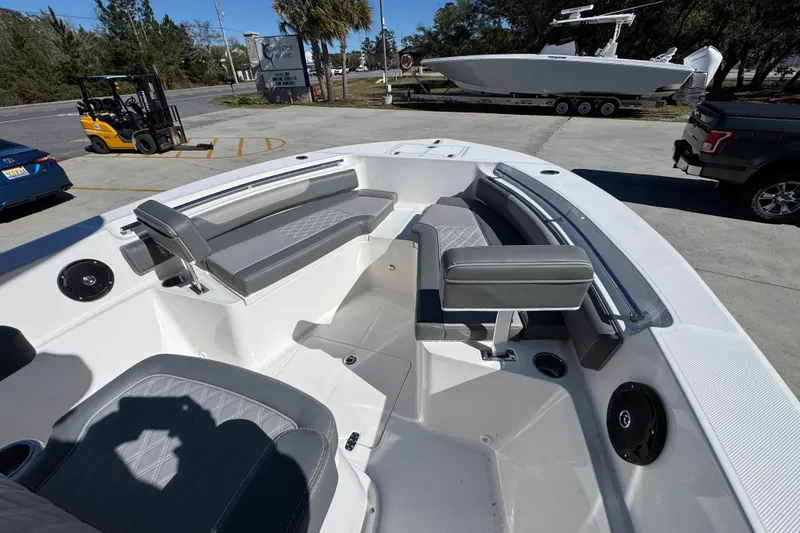 Slide: The Image of 2026 Sea Born LX22 Center Console boat interior with gray seating and modern design. - 20