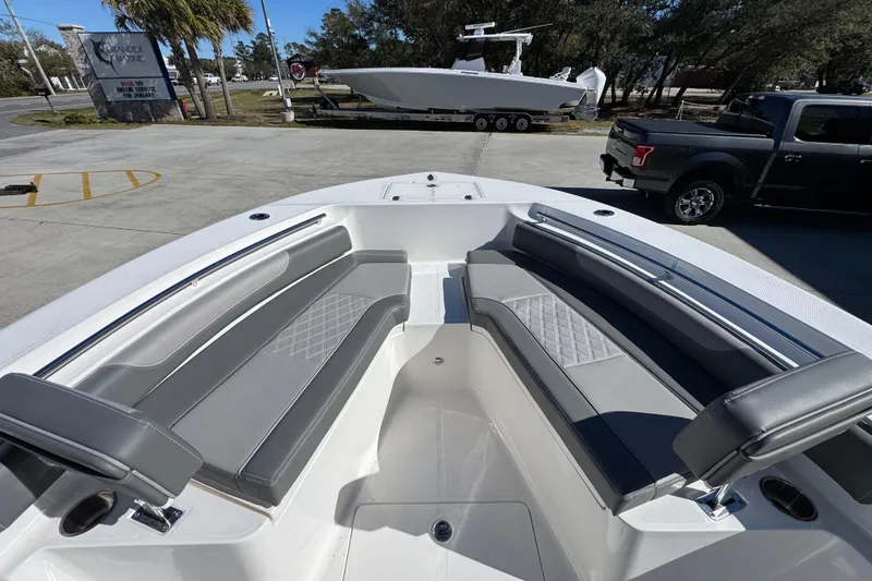 Slide: The Image of 2026 Sea Born LX22 Center Console boat with spacious seating and sleek design. - 21