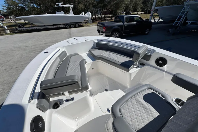 Slide: The Image of 2026 Sea Born LX22 Center Console boat with spacious seating and modern design. - 22