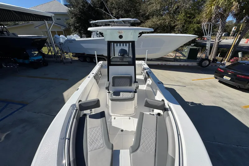 Slide: The Image of 2026 Sea Born LX22 Center Console boat with sleek design and spacious seating. - 24