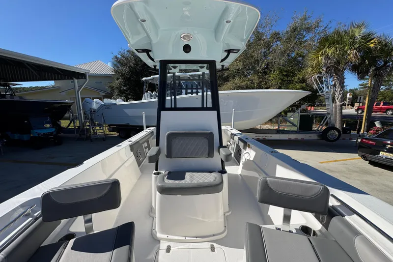 Slide: The Image of 2026 Sea Born LX22 Center Console boat with sleek design and spacious seating. - 25