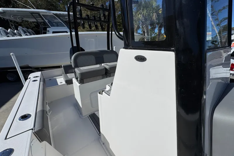 Slide: The Image of 2026 Sea Born LX22 Center Console boat interior with seating and console details. - 27