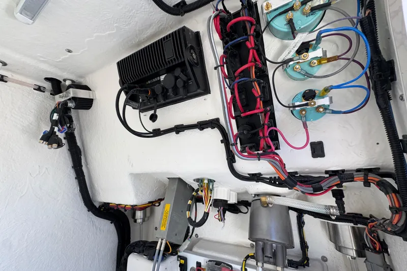 Slide: The Image of Electrical wiring and components inside a 2026 Sea Born LX22 Center Console boat. - 45