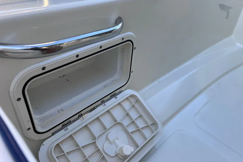 Slide: The Image of Open storage compartment on a 2017 Rigid Boats 14 Sport. - 20
