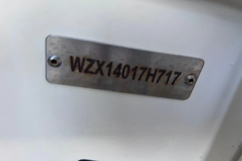 Slide: The Image of Metal identification plate on 2017 Rigid Boats 14 Sport with serial number WZX14017H717. - 23