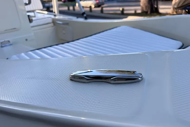 Slide: The Image of 2017 Rigid Boats 14 Sport interior with sleek chrome detail and white seating. - 25