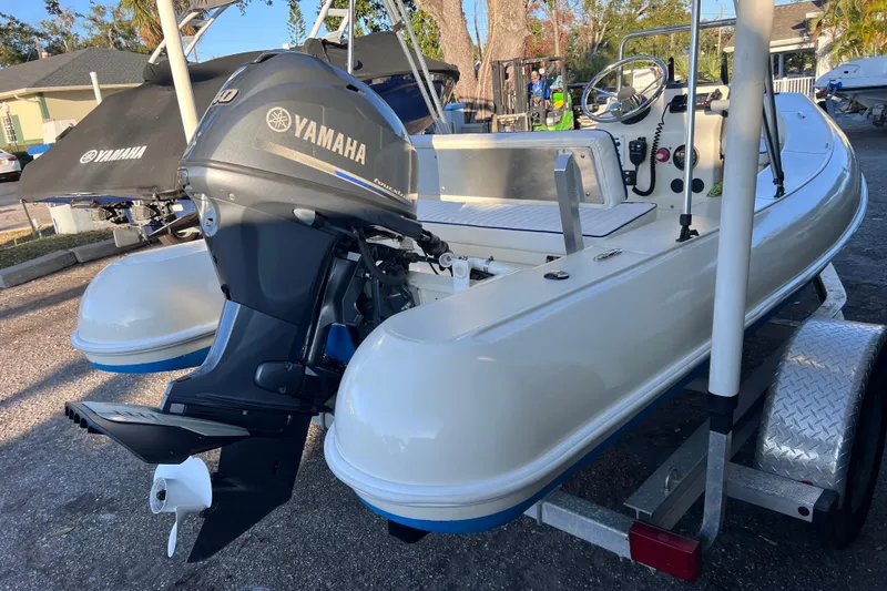 Slide: The Image of 2017 Rigid Boats 14 Sport with Yamaha outboard motor on trailer. - 6