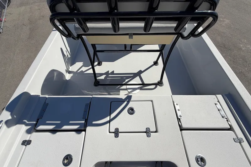 Slide: The Image of 2020 Blazer Bay 2200 Fisherman boat interior with storage compartments and seating. - 16