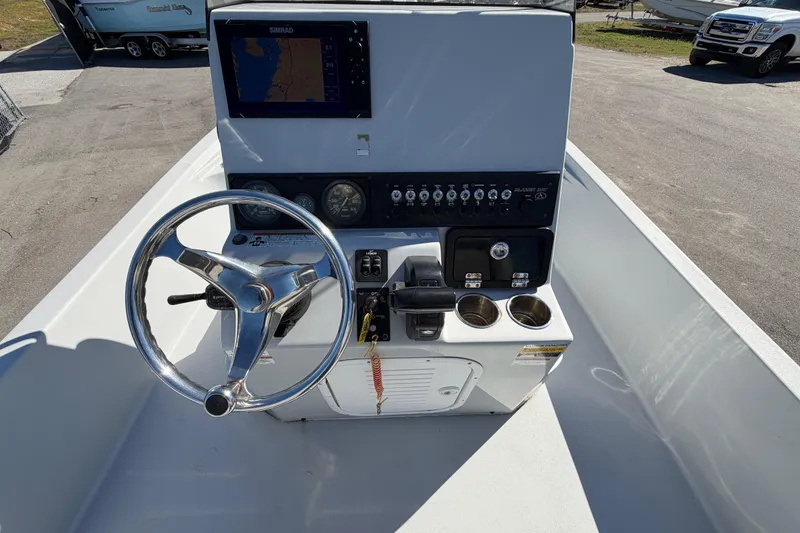 Slide: The Image of 2020 Blazer Bay 2200 Fisherman boat console with steering wheel and navigation system. - 20