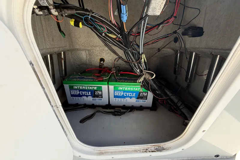 Slide: The Image of 2020 Blazer Bay 2200 Fisherman boat battery compartment with Interstate deep cycle batteries. - 30