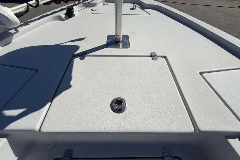 Slide: The Image of 2020 Blazer Bay 2200 Fisherman boat deck with storage compartment and pole mount. - 36