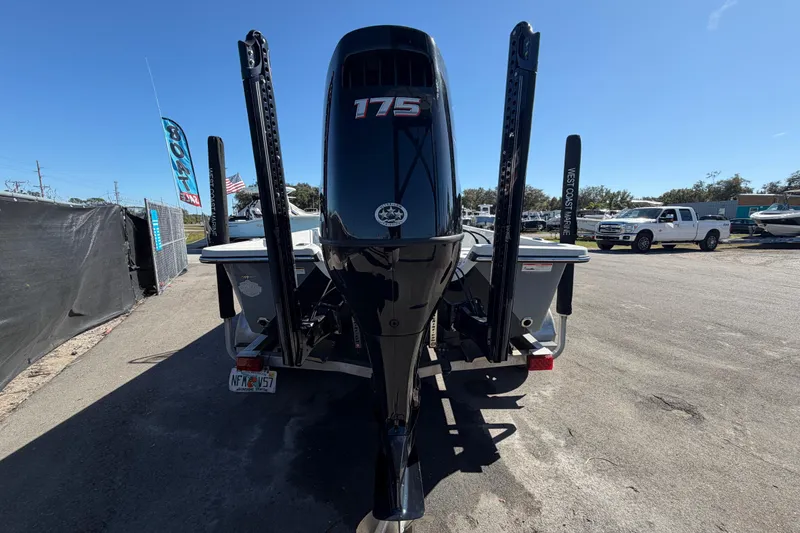 Slide: The Image of 2020 Blazer Bay 2200 Fisherman boat with 175 HP engine at a dealership. - 5
