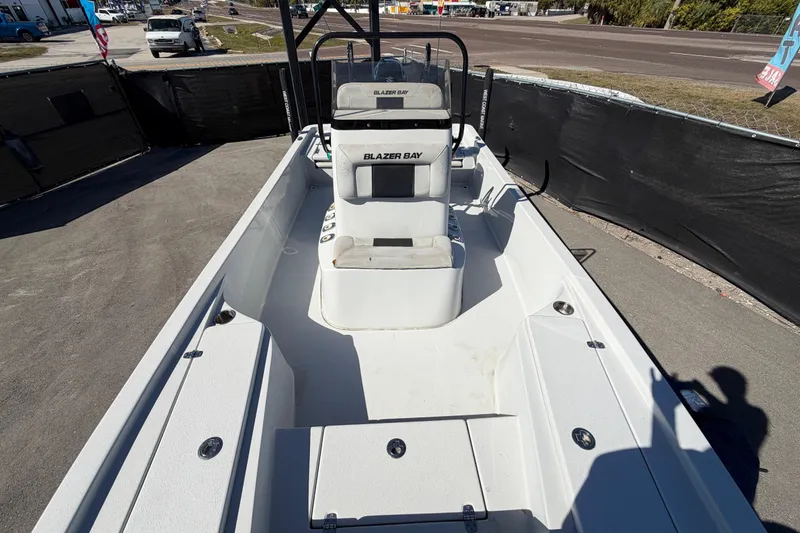 Slide: The Image of 2020 Blazer Bay 2200 Fisherman boat interior, featuring spacious seating and storage. - 51