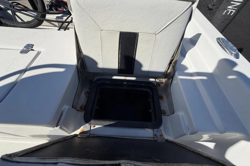 Slide: The Image of 2020 Blazer Bay 2200 Fisherman boat seat with storage compartment open. - 66