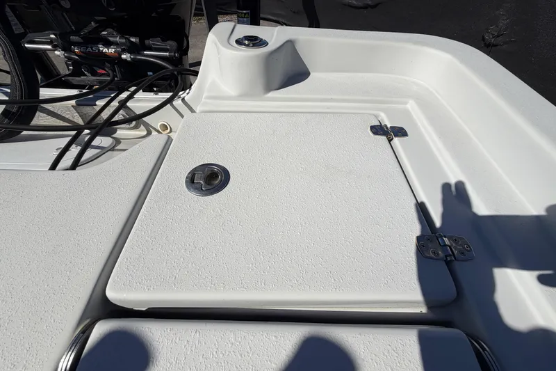 Slide: The Image of 2020 Blazer Bay 2200 Fisherman boat deck with storage compartment and SeaStar hydraulic system. - 67