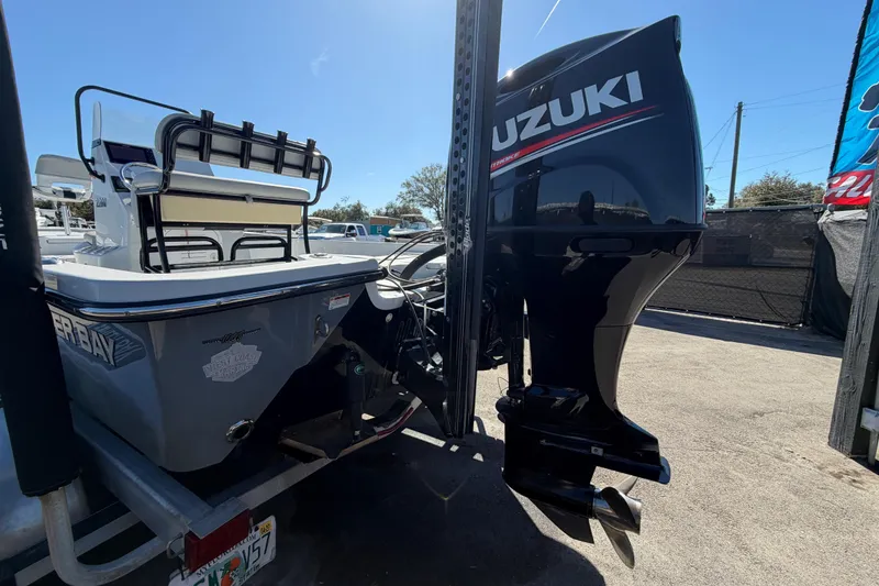 Slide: The Image of 2020 Blazer Bay 2200 Fisherman boat with Suzuki outboard motor on trailer. - 8