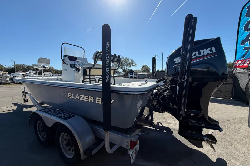 Slide: The Image of 2020 Blazer Bay 2200 Fisherman boat with Suzuki engine on trailer. - 9