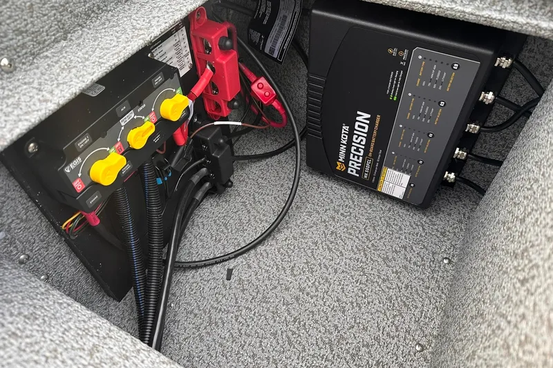 Slide: The Image of Electrical system of 2026 Lund 1875 Impact XS Sport boat with Minn Kota Precision charger. - 24