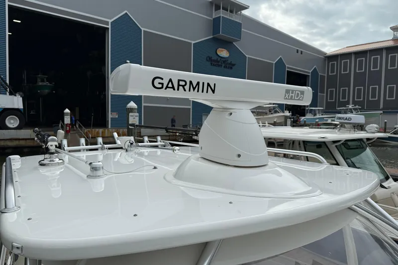 Slide: The Image of 2020 Albemarle 290 Express Fisherman with Garmin radar at a yacht club dock. - 13
