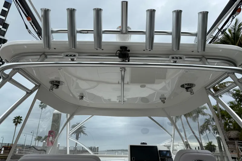 Slide: The Image of 2020 Albemarle 290 Express Fisherman boat with rod holders and sleek design. - 15