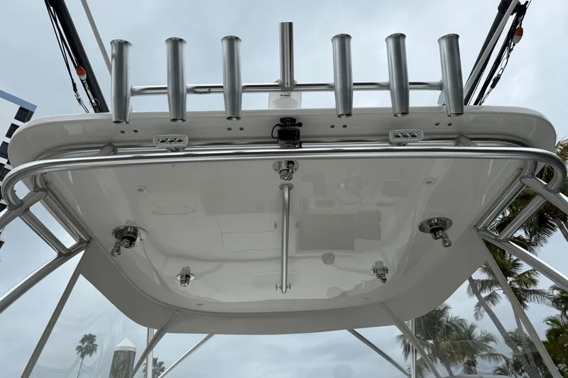 Slide: The Image of 2020 Albemarle 290 Express Fisherman boat with rod holders and stainless steel railings. - 16