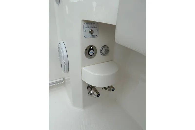 Slide: The Image of 2020 Albemarle 290 Express Fisherman boat control panel with speaker and switches. - 25