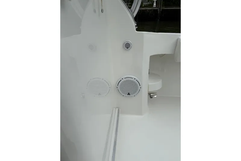 Slide: The Image of 2020 Albemarle 290 Express Fisherman boat interior with speakers and seating. - 26