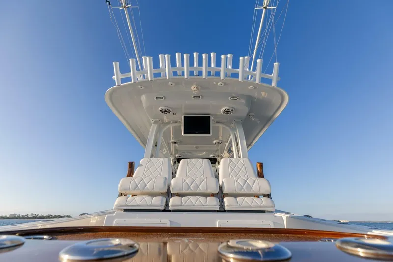 Slide: The Image of Luxury Freeman 47 yacht interior, 2024 model, featuring plush seating and modern design. - 10