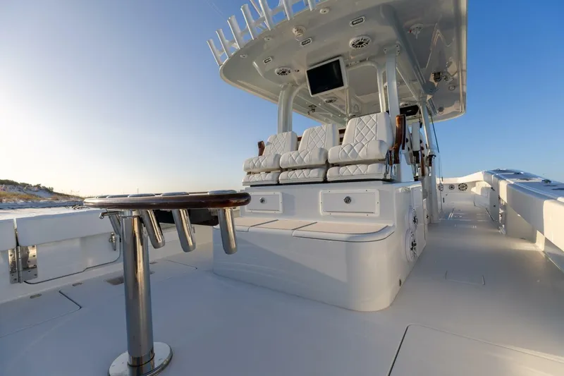 Slide: The Image of Luxurious 2024 Freeman 47 boat interior with plush seating and sleek design. - 12