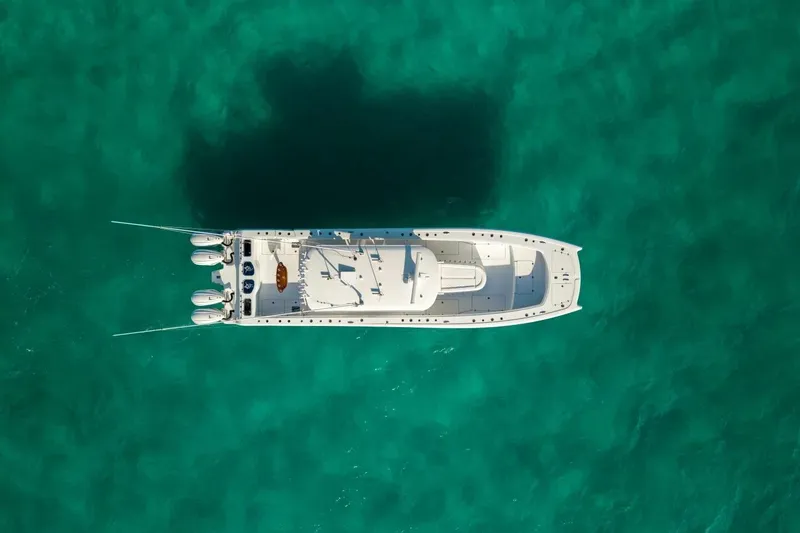Slide: The Image of Aerial view of 2024 Freeman 47 boat on clear turquoise water. - 29