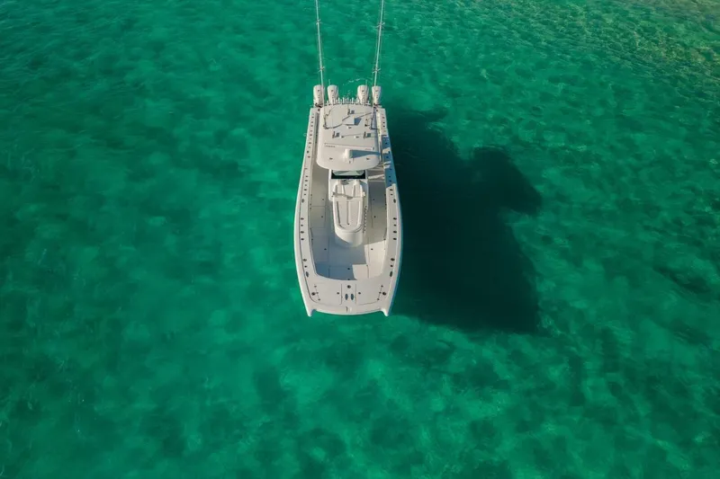 Slide: The Image of Aerial view of 2024 Freeman 47 boat on clear turquoise water. - 30