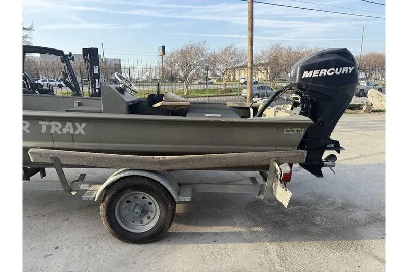Slide: The Image of 2012 Gator Trax 17X54 boat with Mercury outboard motor on a trailer. - 3
