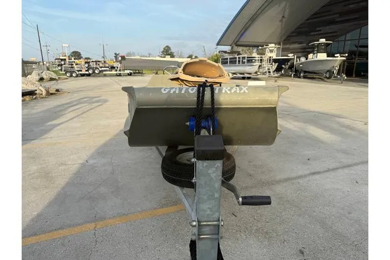 Slide: The Image of 2012 Gator Trax 17X54 boat on trailer in outdoor lot. - 6