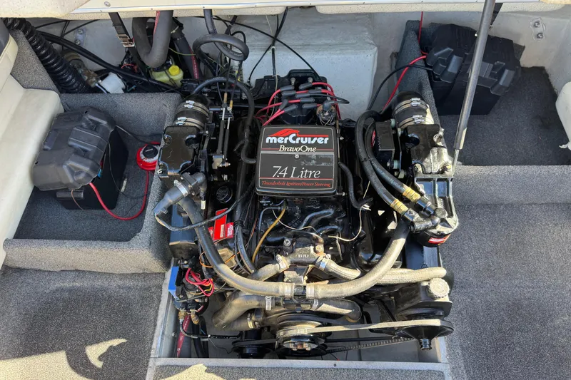 Slide: The Image of 1988 Cobalt 222 boat engine compartment with MerCruiser 7.4L engine. - 16