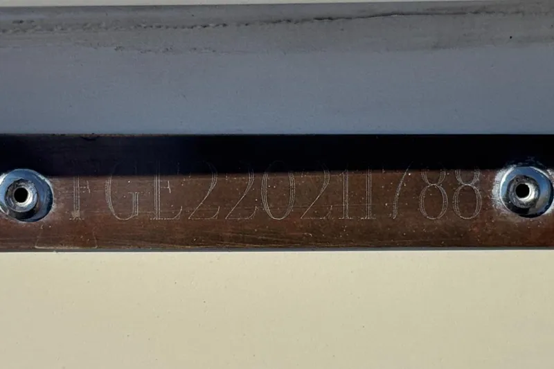 Slide: The Image of Engraved serial number on 1988 Cobalt 222 boat hull plate. - 28
